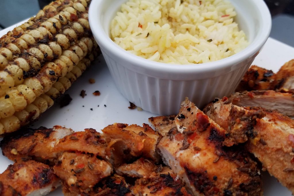 grilled moroccan chicken, corn, and rice pilaf